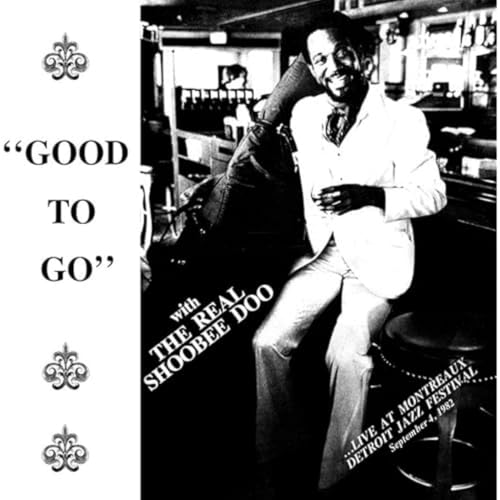 Black and white album cover featuring a musician with a saxophone.