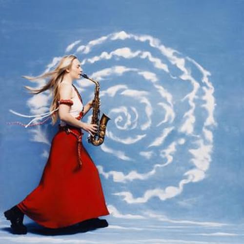 Woman playing saxophone against a swirling cloud-filled blue sky.