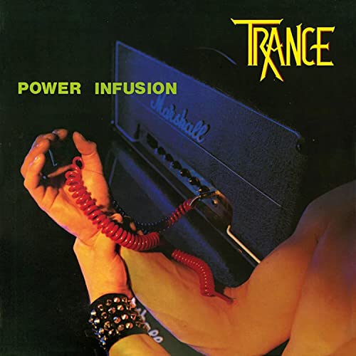 Album cover: hand chained to a guitar amplifier, band name "Trance".