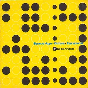 Yellow CD cover with black and white circles, text “Interface”.