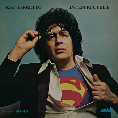 Ray Barretto album cover: man in suit with Superman logo.