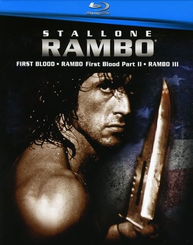 Blu-ray cover featuring Sylvester Stallone as Rambo holding a large knife against American flag.
