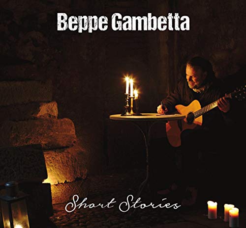 Beppe Gambetta album cover: man with guitar, candles, stone wall.