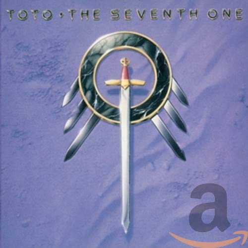 Toto’s “The Seventh One” CD cover: sword through a circular, winged design.