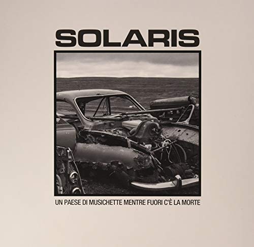 Solaris album cover: wrecked car in a field under a cloudy sky.