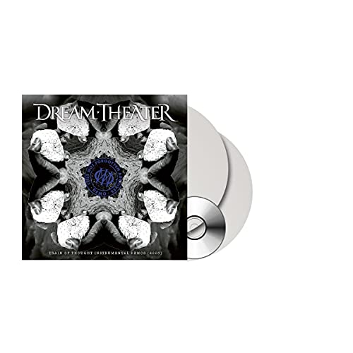 Dream Theater album cover with a CD, featuring a dark floral design.