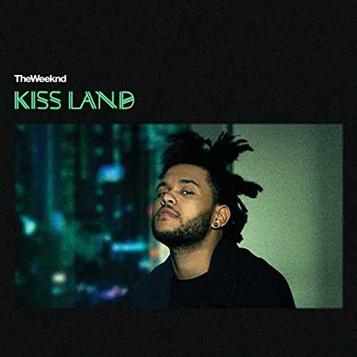The Weeknd Kiss Land album cover featuring a portrait of the artist against city lights.