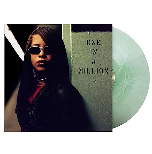 Aaliyah album cover “One In A Million” with a pale green vinyl record.