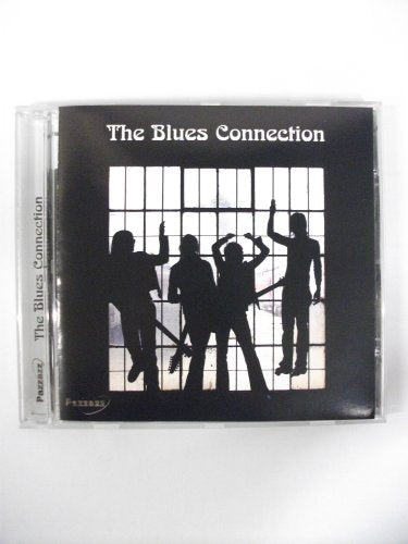 CD case with silhouetted musicians against a window background.