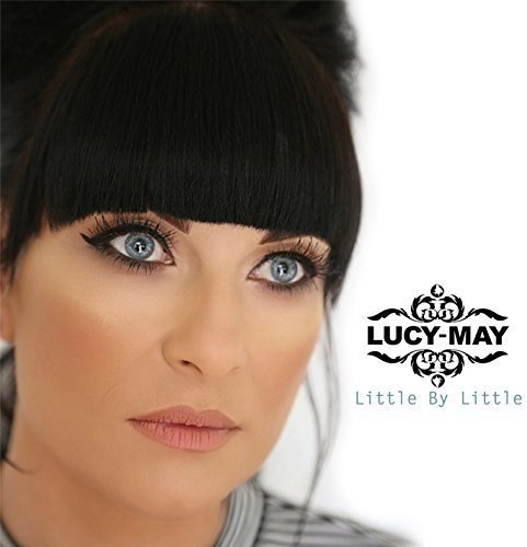 Close-up of a woman with dark hair and the album cover logo.