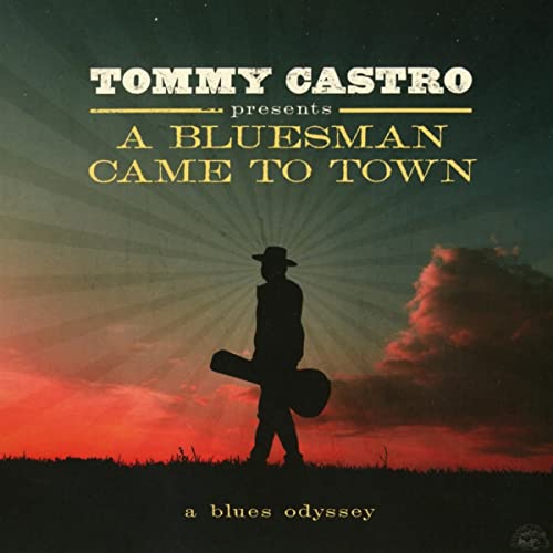 CD cover: silhouetted bluesman with guitar against a sunset sky.