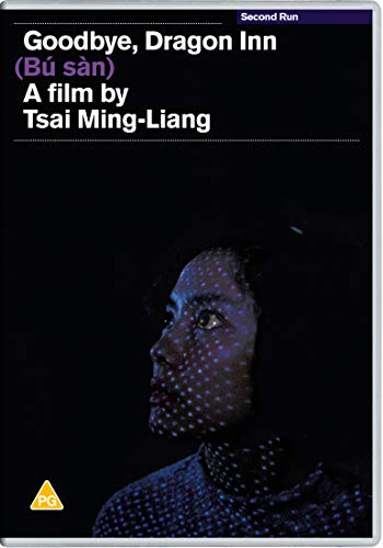 DVD cover for “Goodbye, Dragon Inn” featuring a woman’s face in darkness.