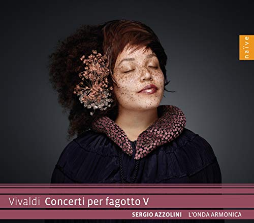 CD cover: woman with flowers in hair, eyes closed, dark background.