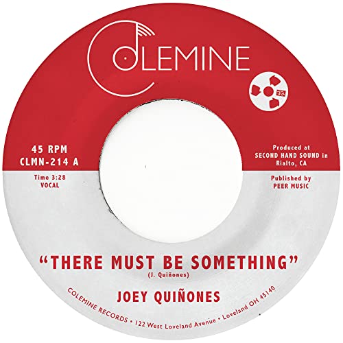 Red and white 7-inch vinyl record label with text and logo details.