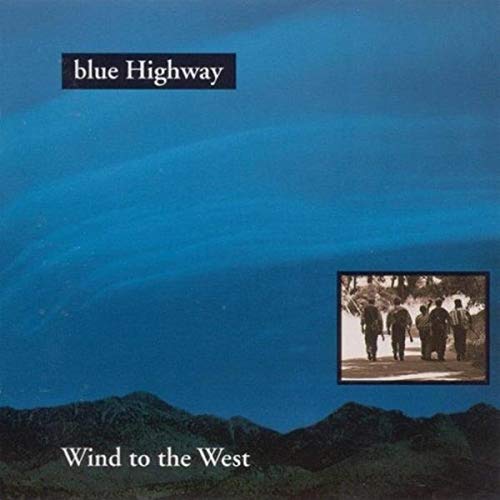 CD cover: blue sky, mountains, and a black and white photo of men.