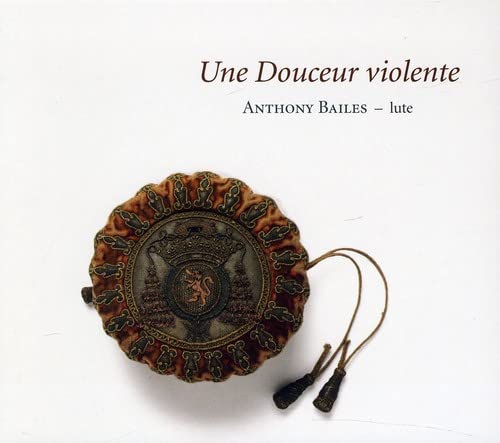 CD cover featuring an ornate, circular antique object with tassels.