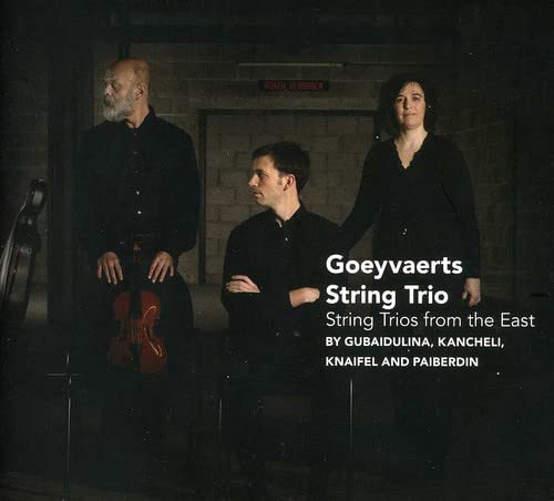 CD cover featuring three musicians, a man with a beard, and text details.