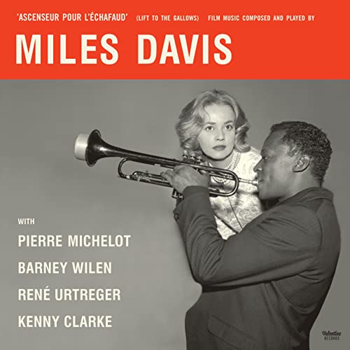 Miles Davis playing trumpet with Jeanne Moreau on the Ascenseur pour l'échafaud album cover.