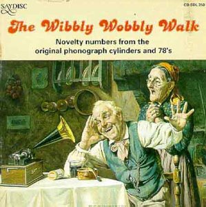 CD cover: elderly couple reacting to music from a vintage phonograph.