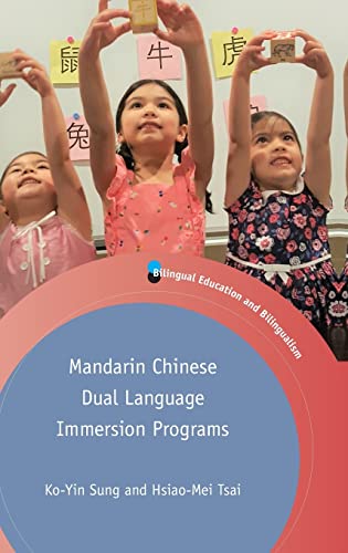Children holding flashcards with Chinese characters, book cover for Mandarin immersion programs.