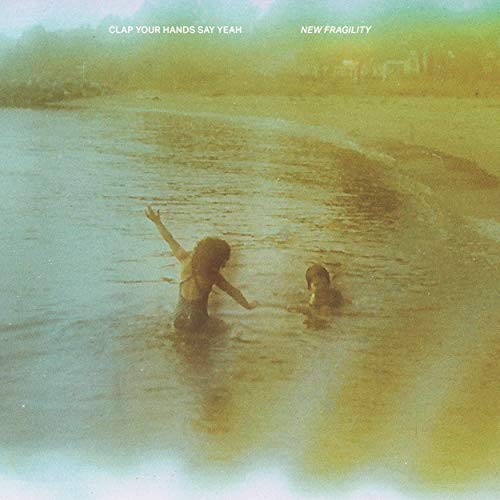 CD cover: two figures in water with a hazy, vintage aesthetic.