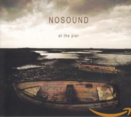 CD cover for Nosound’s “At The Pier” featuring a coastal landscape.