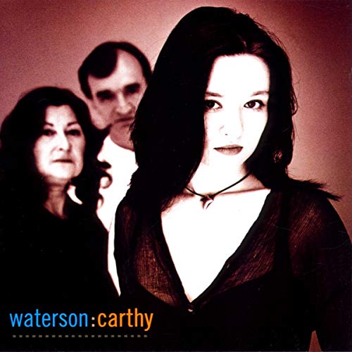 CD cover featuring three people with dark hair, a woman in front.