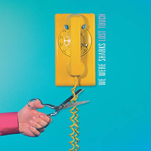 Yellow rotary phone being cut with scissors, album cover for We Were Sharks.