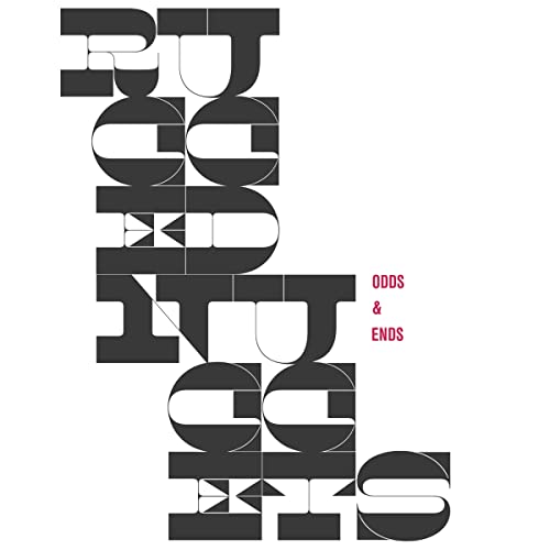 Album cover with stacked, overlapping black letters and red text.