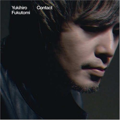 CD cover featuring a close-up portrait of a man with dark hair.