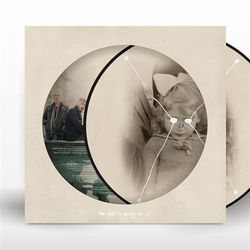 Vinyl record cover with a vintage photograph of people in a park.