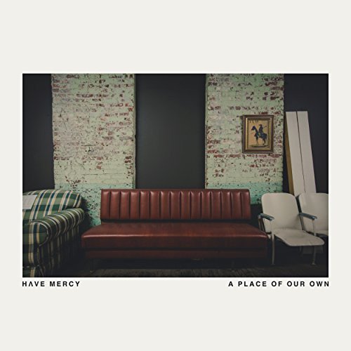 CD cover: vintage furniture against a distressed brick wall.