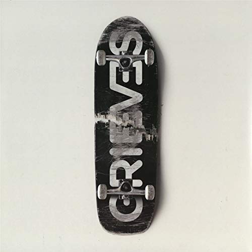 Black vinyl record with white distressed text reading "Grieves.
