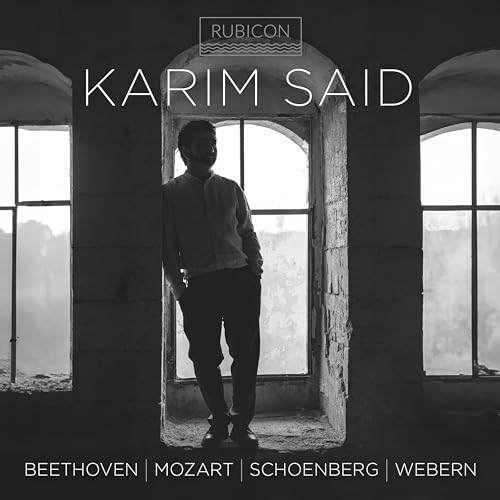 Black and white album cover featuring pianist Karim Said standing in a doorway.