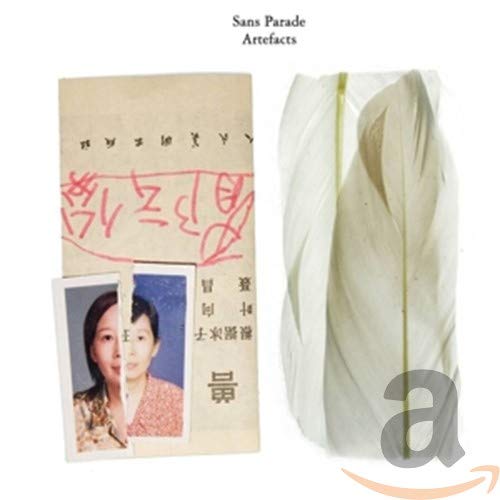 CD cover with a feather, ID photo, and abstract drawing.