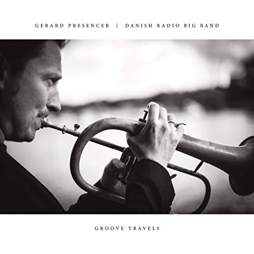 Close-up of a man playing a trumpet, album cover for “Groove Travels”.