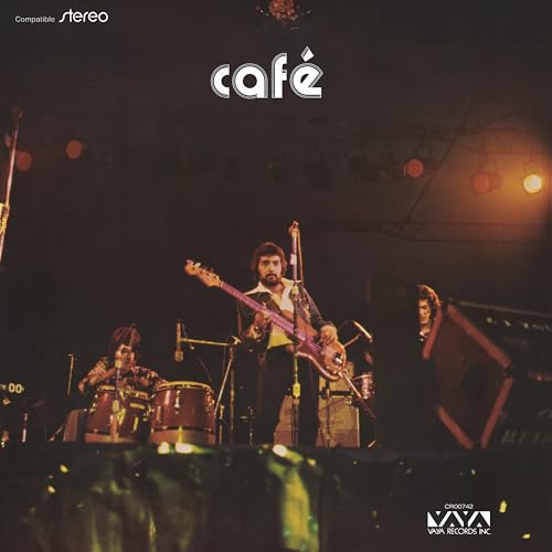 Band performing on stage, album cover for “Café” vinyl record.