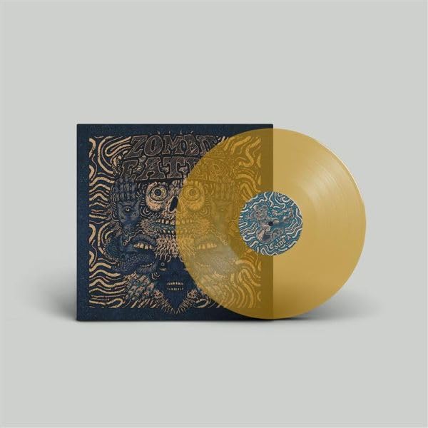 Yellow vinyl record with illustrated cover featuring a monstrous face.