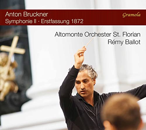 CD cover: conductor Rémy Ballot with orchestra and religious sculpture.