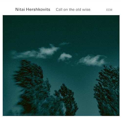CD cover with dark blue sky, white clouds, and silhouetted trees.