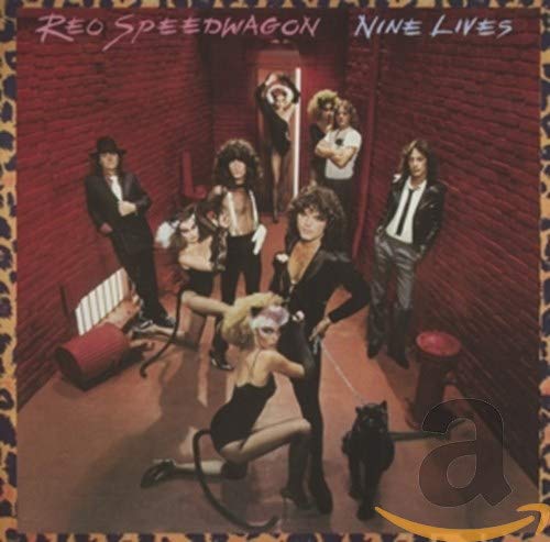 Reo Speedwagon album cover, “Nine Lives,” featuring band members and a black cat.