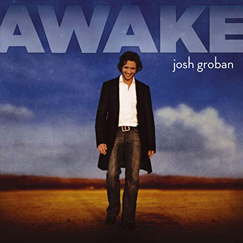 Josh Groban album cover, "Awake," featuring him in a suit and jeans.