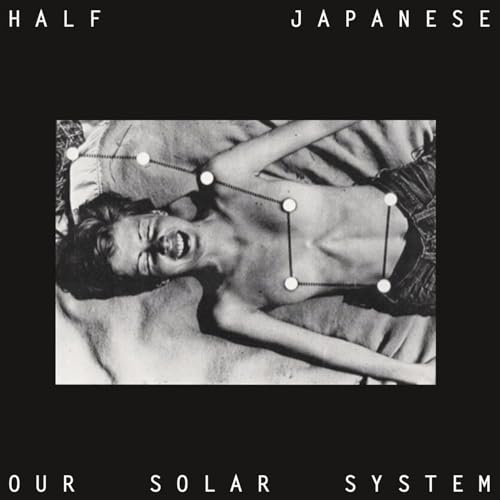 Black and white album cover with a person and planetary orbits.