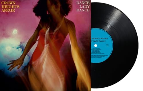 Vinyl record with album cover featuring a blurred image of a dancer.