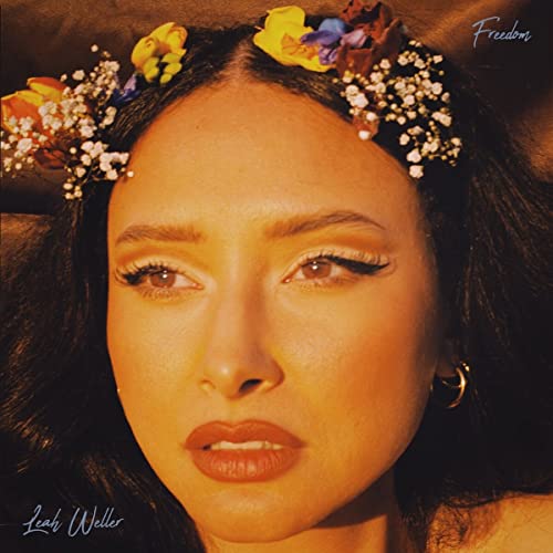 CD cover featuring Leah Weller with a floral crown, warm tones.