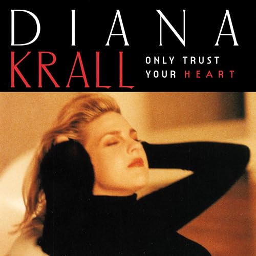 Album cover featuring Diana Krall with eyes closed, wearing a black turtleneck, warm lighting.
