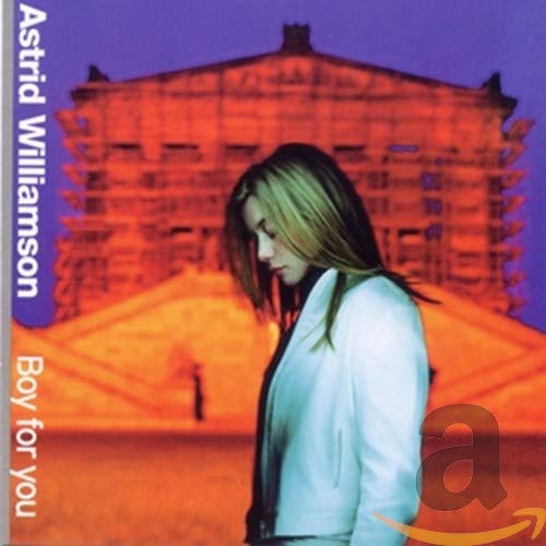 CD cover: Astrid Williamson portrait with blurred building backdrop.