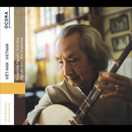 CD cover featuring a Vietnamese musician playing a stringed instrument.