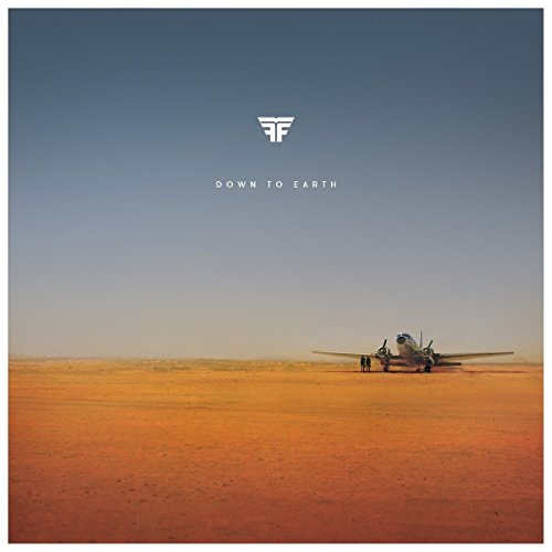 Album cover: small plane on a vast, orange desert landscape.