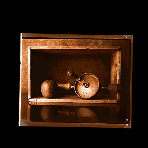 Dark, sepia-toned album cover featuring antique kitchen tools in a box.